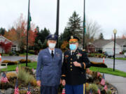 Retired Air Force Capt. Larry Bone, who received a Joint Services Commendation, left, and retired Army Col. Jonathan Frederick, who served more than 30 years, pose in uniform during Touchmark at Fairway Village's Veterans Day celebration.