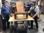 Jeff Chandler, Ken Leffel, Jim Pearson and Doug Corso build Adirondack chairs to raise funds for Friends of the Carpenter.