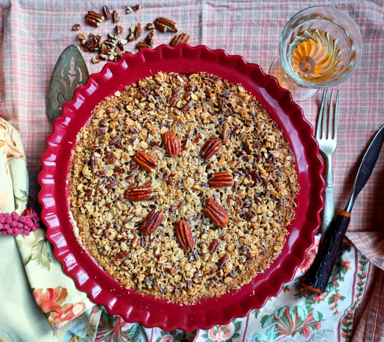 This Pecan Bourbon Pie is my mother's recipe, chock full of nuts and old-fashioned rolled oats.