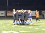 The Hockinson girls soccer team celebrates after beating Sehome in a penalty kick shootout in the first round of the Class 2A state playoffs on Wednesday in Battle Ground.