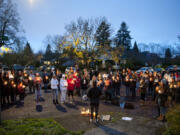 About 100 people gathered Saturday for a candlelight vigil for Monica "Star" Murrah, whose estranged husband is accused of fatally stabbing her Nov. 7 at her Arnada neighborhood home in Vancouver. Among those who memorialized Murrah as a "positive light," some who attended the vigil also shared their own experiences with domestic violence.