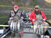 Chris Sessions and Blake Ramsey with a catch of Black Friday rainbow trout. They were fishing with Buzz Ramsey, one of the original anglers that pushed for the yearly event.