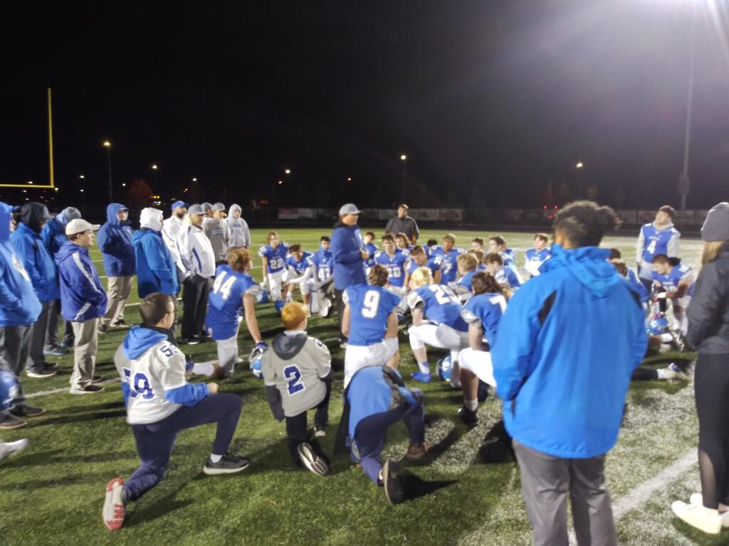 La Center coach John Lambert addresses his team after a playoff loss to Montesano on Friday in Woodland (Tim Martinez/The Columbian)