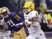 Arizona State's Rachaad White (3) runs for a touchdown against Washington during the second half of an NCAA college football game Saturday, Nov. 13, 2021, in Seattle. Arizona State won 35-30.