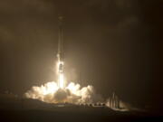 The SpaceX Falcon 9 rocket launches with the Double Asteroid Redirection Test, or DART, spacecraft onboard, Tuesday, Nov. 23, 2021, Pacific time (Nov. 24 Eastern time) from Space Launch Complex 4E, at Vandenberg Space Force Base in Calif. NASA launched the spacecraft on a mission to smash into an asteroid and test whether it would be possible to knock a speeding space rock off course if one were to threaten Earth.