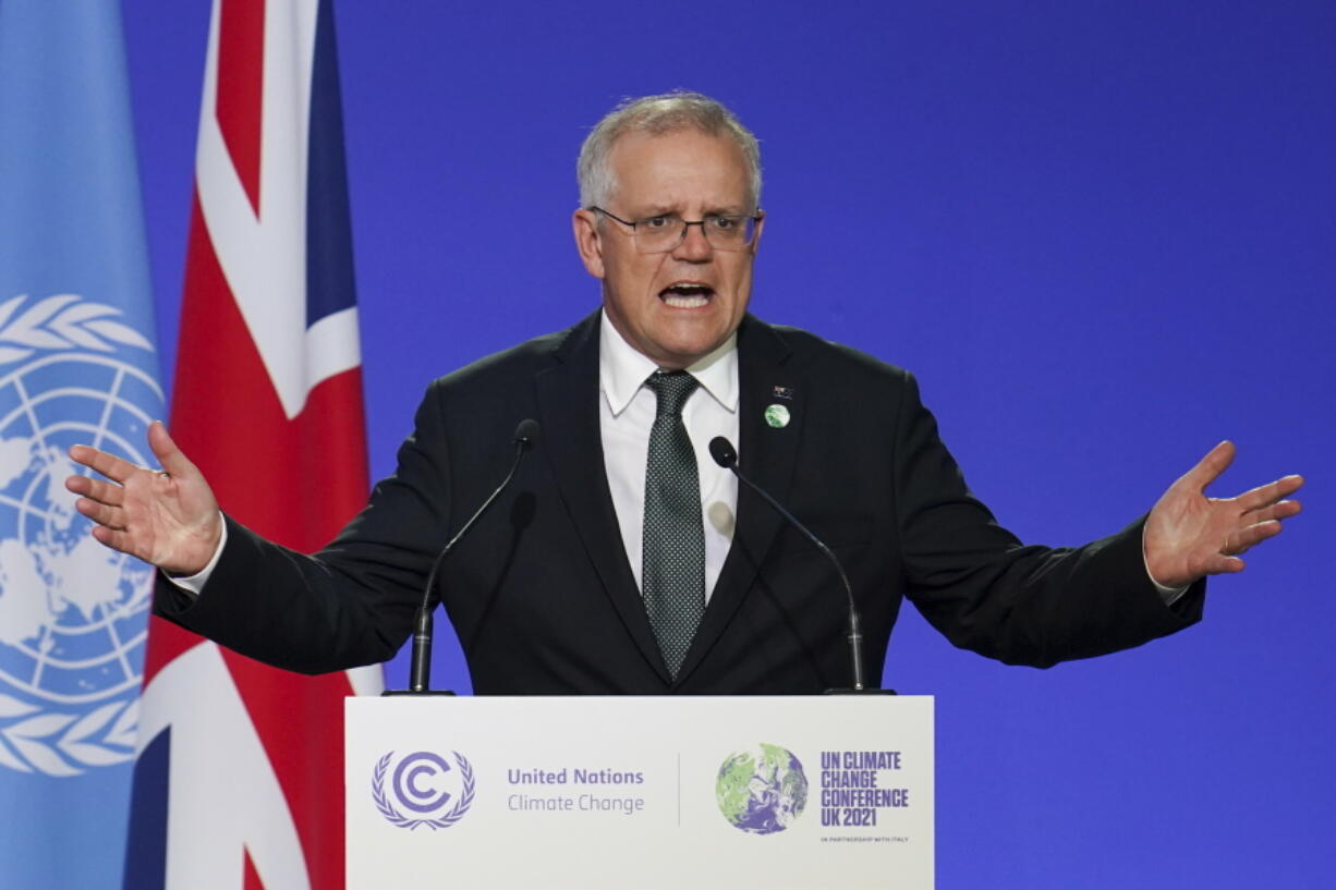 FILE - Scott Morrison, Prime Minister of Australia delivers an address, during the COP26 Summit, at the SECC in Glasgow, Scotland, Monday, Nov. 1, 2021.  Morrison on Tuesday, Nov.