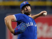 Toronto Blue Jays' Robbie Ray won the AL Cy Young Award on Wednesday, Nov. 17, 2021, bouncing back from taking a rare pay cut after a dismal season to capture pitching's top prize. Ray became the first Toronto pitcher to earn the honor since the late Roy Halladay in 2003.