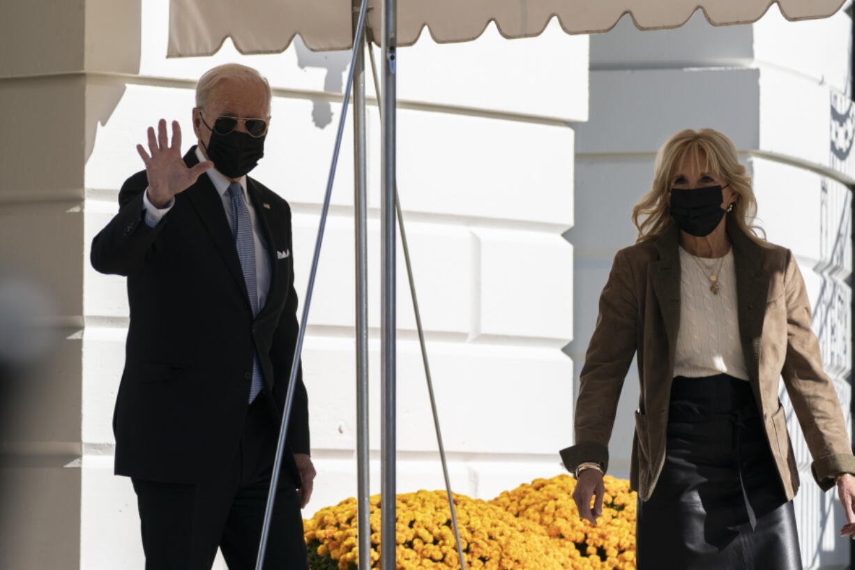 President Joe Biden, and first lady Jill Biden walk to board Marine One on the South Lawn of the White House in Washington, Saturday, Nov. 6, 2021. Biden is spending the weekend at his home in Rehoboth Beach, Del.