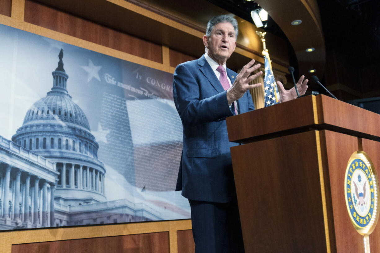 Sen. Joe Manchin, D-W.Va., speaks with reporters during a news conference on Capitol Hill, Monday, Nov. 1, 2021 in Washington.