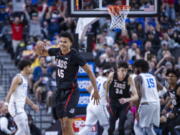 Gonzaga guard Rasir Bolton (45) celebrates a 3-point basket against UCLA during the first half of an NCAA college basketball game Tuesday, Nov. 23, 2021, in Las Vegas. (AP Photo/L.E.