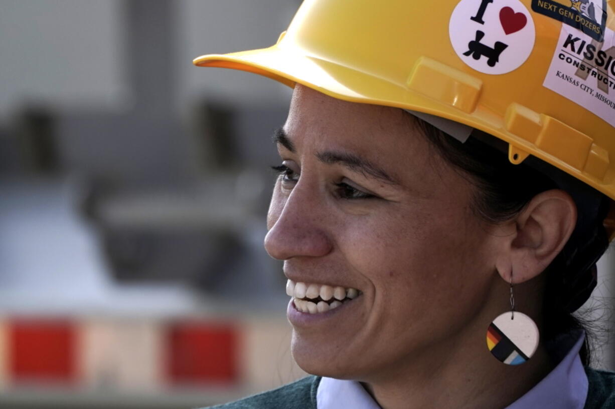 U.S. Rep. Sharice Davids, D-Kan., talks to the media during a news conference to talk about the recently passed $1.2 trillion infrastructure bill at a Kansas Department of Transportation facility Tuesday, Nov. 9, 2021, in Stilwell, Kan.