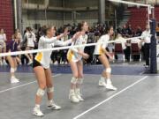 Columbia River players, from left, Caroline Hansen, Sydney Dreves and Lauren Dreves, await a serve in a 2A state quarterfinal match on Friday in Yakima.