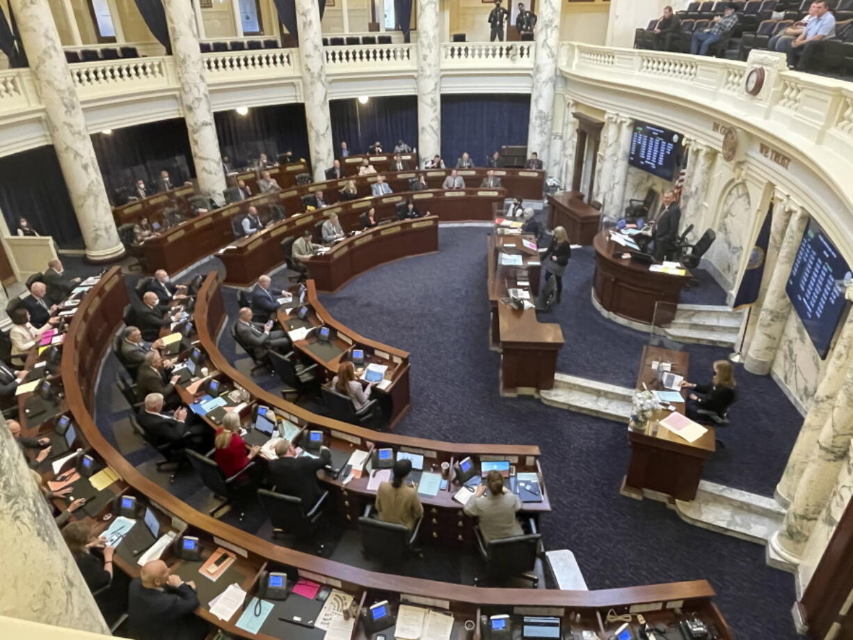 House members meet March 9 in the Statehouse in Boise, Idaho. An Idaho law banning nearly all abortions would take effect if the U.S. Supreme Court overturns Roe v. Wade, the landmark 1973 ruling that declared a nationwide right to abortion.