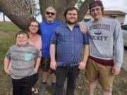 This photo provided by Nancy Sack shows Carter Lange, Kim Gustavson,  Jason Lange, Matthew Gustavson and Travis Gustavson.