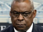 Secretary of Defense Lloyd Austin pauses while speaking during a media briefing at the Pentagon, Wednesday, Nov. 17, 2021, in Washington.