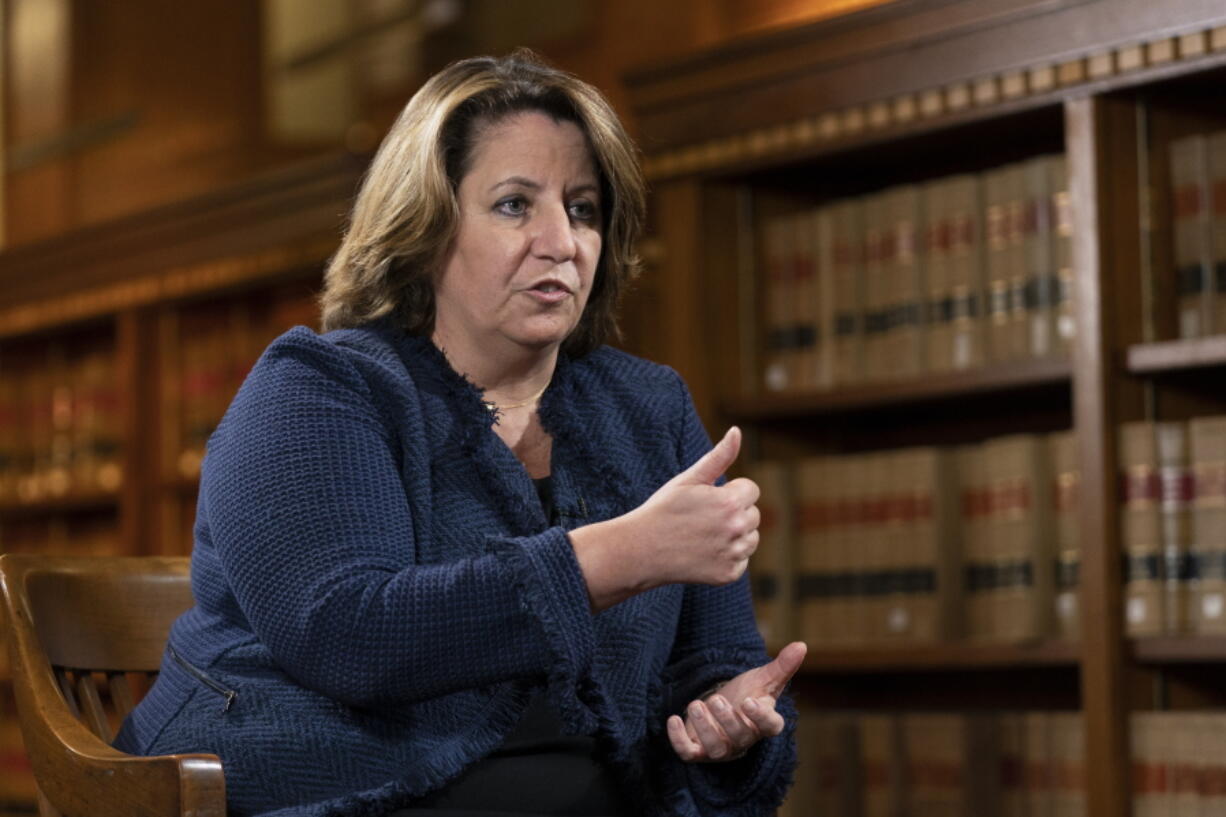 Deputy Attorney General Lisa Monaco speaks to The Associated Press during an interview at the Department of Justice in Washington, Tuesday, Nov. 2, 2021. Monaco told the AP that the public should expect to see more arrests and law enforcement action as the Justice Department deals with the threat of ransomware.