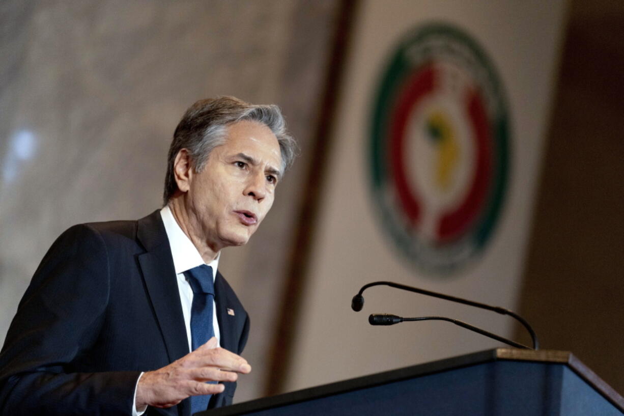 FILE - Secretary of State Antony Blinken gives a speech on U.S. Africa Policy at the Economic Community of West African States in Abuja, Nigeria, Nov. 19, 2021. The Biden administration formally revoked the terrorist designation of Colombia's former FARC guerrilla army on Tuesday, Nov. 30, but newly imposed the designation on commanders and offshoots of the group who have refused to lay down their arms.