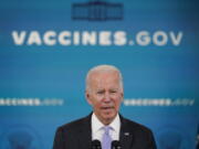 FILE - President Joe Biden talks about the newly approved COVID-19 vaccine for children ages 5-11 from the South Court Auditorium on the White House complex in Washington, Nov. 3, 2021. Biden's team views the pandemic as the root cause of both the nation's malaise and his own political woes. It sees getting more people vaccinated and finally controlling COVID-19 as the key to reviving the country and Biden's own standing. But the coronavirus has proved to be a vexing challenge for the White House.