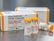 FILE - This October 2021, photo provided by Pfizer shows kid-size doses of its COVID-19 vaccine in Puurs, Belgium.