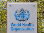 FILE - The logo of the World Health Organization, WHO, is displayed at the  headquarters in Geneva, Switzerland, April 15, 2020. The World Health Organization is opening a long-planned special session of member states to discuss ways to strengthen the global fight against pandemics like the coronavirus, just as the worrying new omicron variant has sparked immediate concerns worldwide.