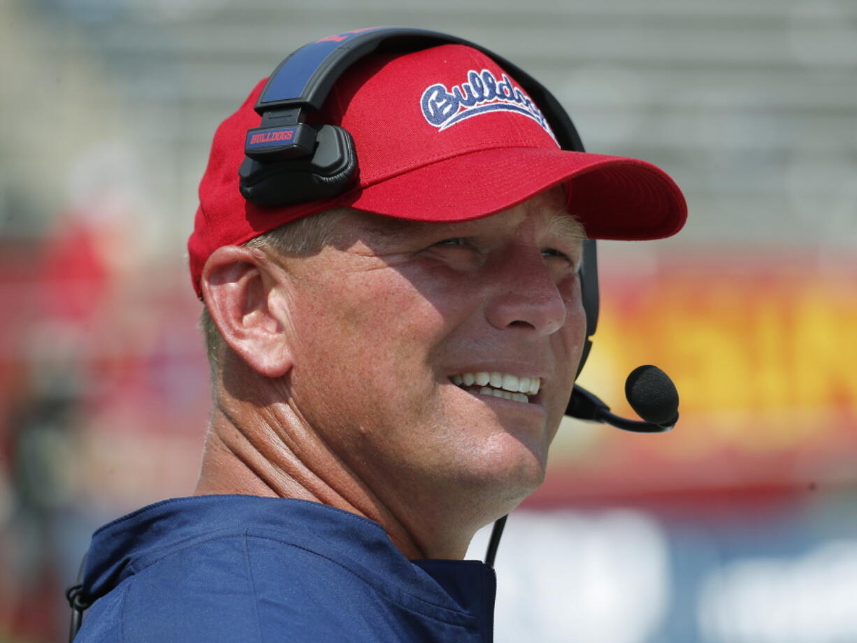 FILE - Fresno State coach Kalen DeBoer watches the team play Connecticut during the second half of an NCAA college football game in Fresno, Calif., Saturday, Aug. 28, 2021. Washington is in talks with Fresno State's Kalen DeBoer to be its next head coach, two people familiar with the discussions between the Bulldogs' coach and the Pac-12 school told AP on Monday, Nov. 29, 2021.