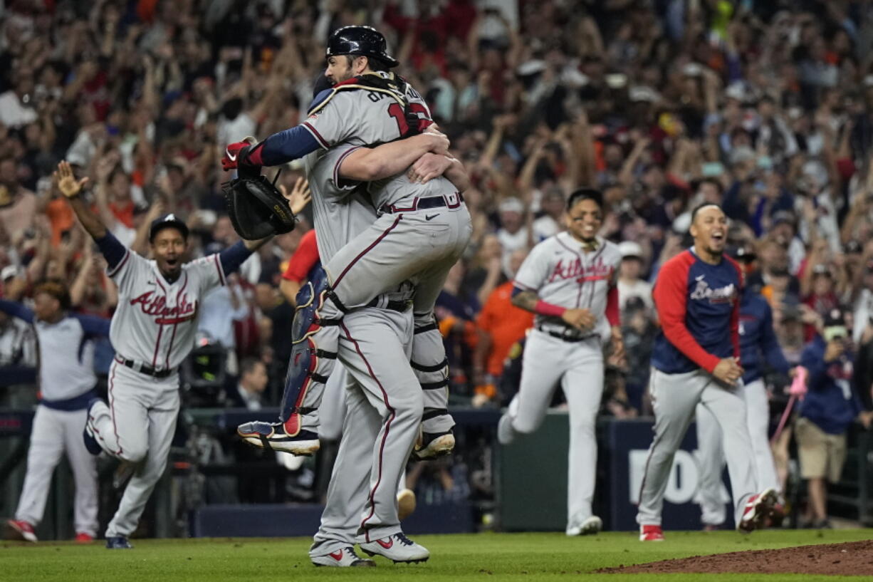 The Atlanta Braves celebrate after winning baseball's World Series in Game 6 against the Houston Astros Tuesday, Nov. 2, 2021, in Houston. The Braves won 7-0. (AP Photo/David J.