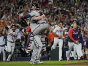 The Atlanta Braves celebrate after winning baseball's World Series in Game 6 against the Houston Astros Tuesday, Nov. 2, 2021, in Houston. The Braves won 7-0. (AP Photo/David J.