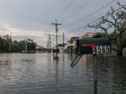 A mailbox is seen in floodwater Sept. 1 in Jean Lafitte, La. Hurricane Ida made landfall as a Category 4 hurricane on Aug. 29 in Louisiana and brought flooding and wind damage along the Gulf Coast.