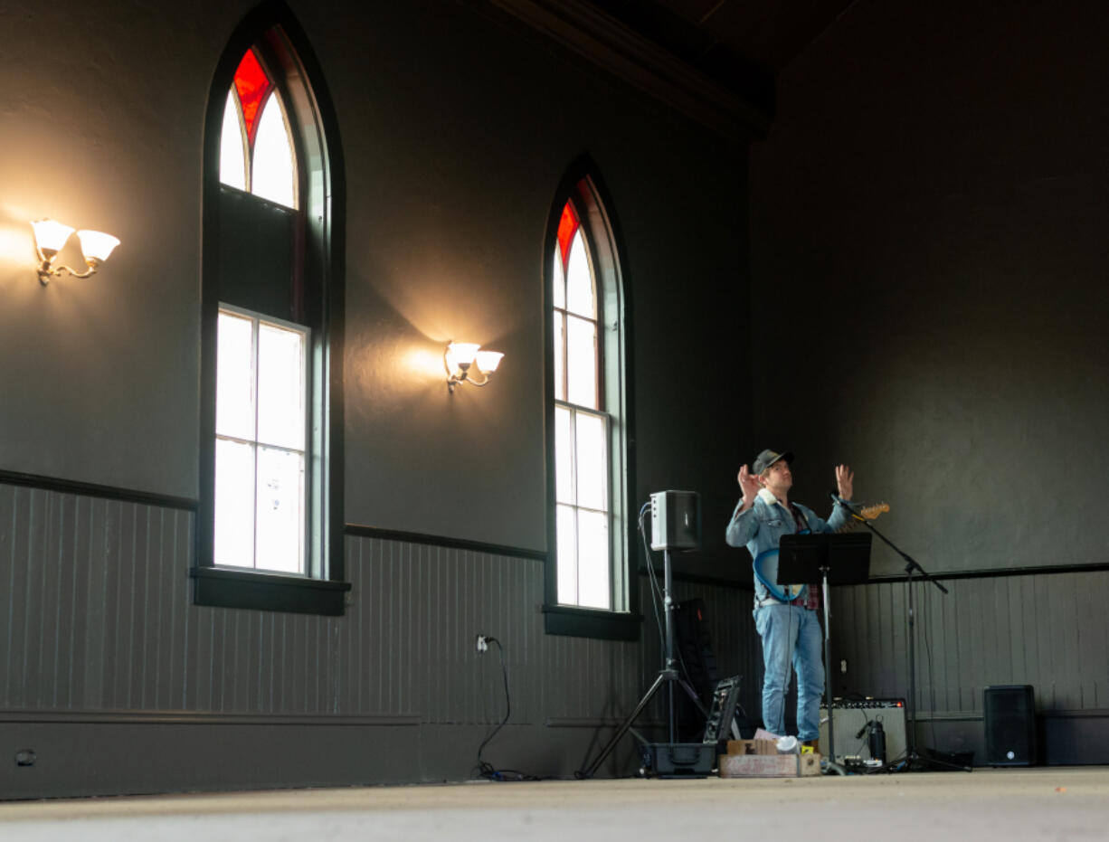 Local musician Matt Brown performs at a recent open house event at The Neighborhood Refuge in Ridgefield. The pub is expected to open on the Fourth of July.