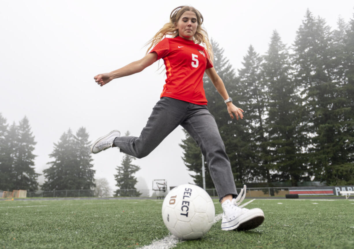 Camas High School senior Maya Parman kicks a soccer ball Tuesday, Dec. 7, 2021, at Cardon Field. Parman is the All-Region girls soccer player of the year.