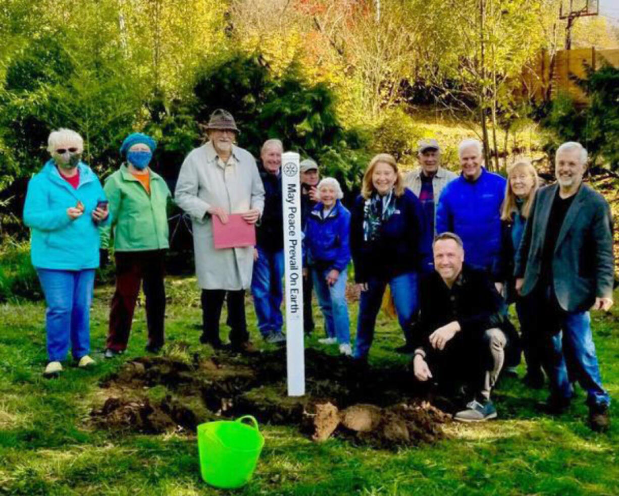 Rotary Club members recently installed a new Peace Pole at Jane Webber Evergreen Arboretum.