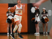 Washougal senior Jaiden Bea yells instructions to the team Tuesday, Dec. 14, 2021, during the Panthers' 57-54 win against Hudson's Bay at Washougal High School.