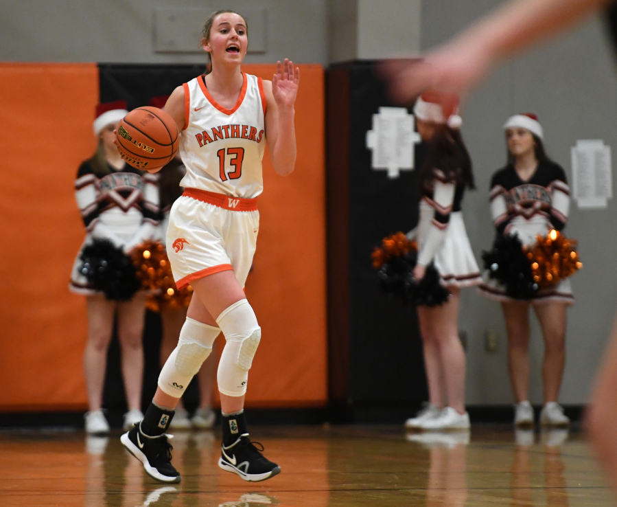Washougal senior Jaiden Bea yells instructions to the team Tuesday, Dec. 14, 2021, during the Panthers' 57-54 win against Hudson's Bay at Washougal High School.