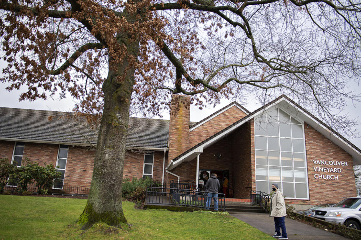 Shoppers and proud parents alike wait to take part in the Lupine Holiday Market at Vancouver Vineyard Church on Thursday afternoon.