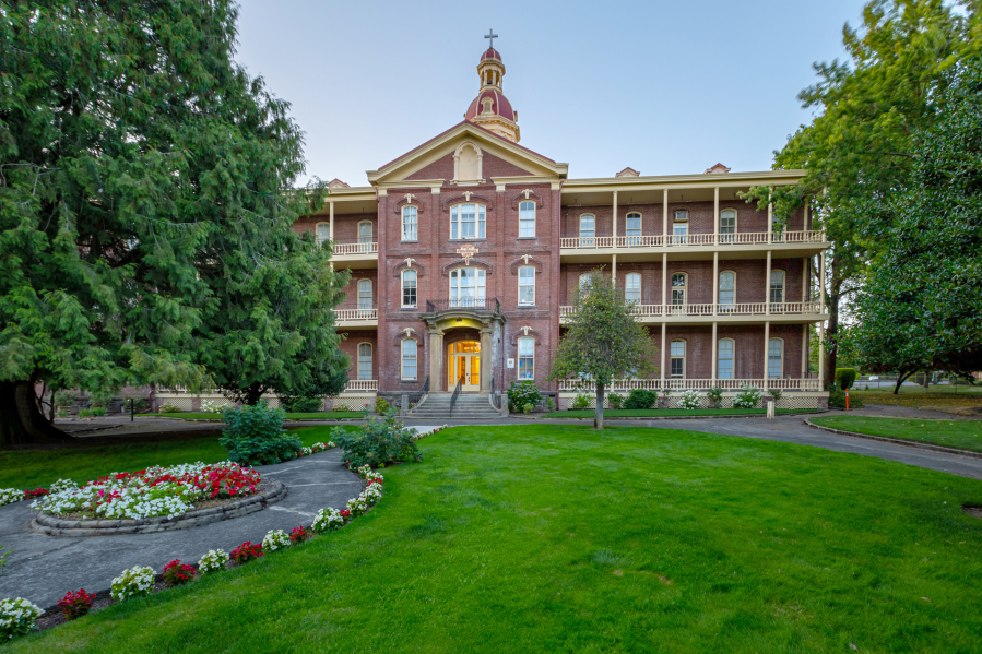 Visitors to Providence Academy can walk through the heart-shaped Sacred Heart Garden, which was designed by Mother Joseph in 1876. The garden adorns the front of the academy's main entrance.