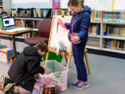 RIDGEFIELD: Battle Ground Public Schools sent 40 boxes of their excess books to Ridgefield school libraries. The popularity and quantity of donated books were a perfect gift for Ridgefield's school library programs.