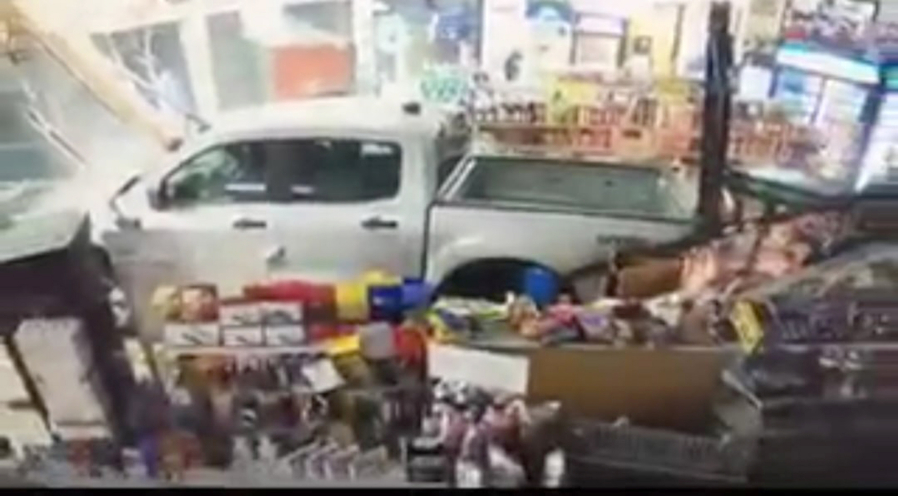 A stolen truck crashed through the window at the Lewisville Market & Deli early Sunday.