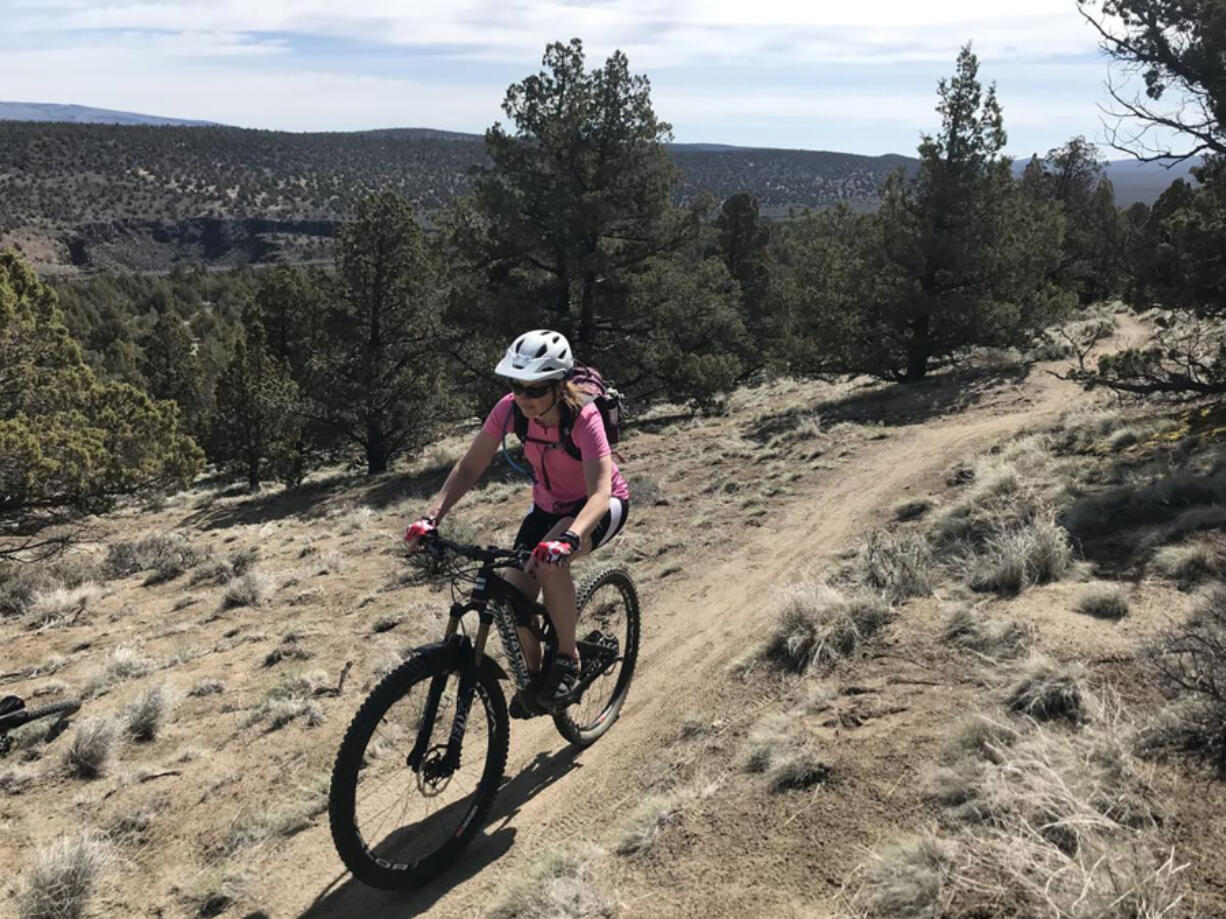 A mountain biker riding singletrack on Horse Ridge.