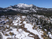 An aerial view of Mammoth Mountain from above Mammoth Creek in Mammoth Lakes, California on Oct. 27, 2021. A new study paints a dire forecast for snowpack in the Sierra Nevada in the coming decades.