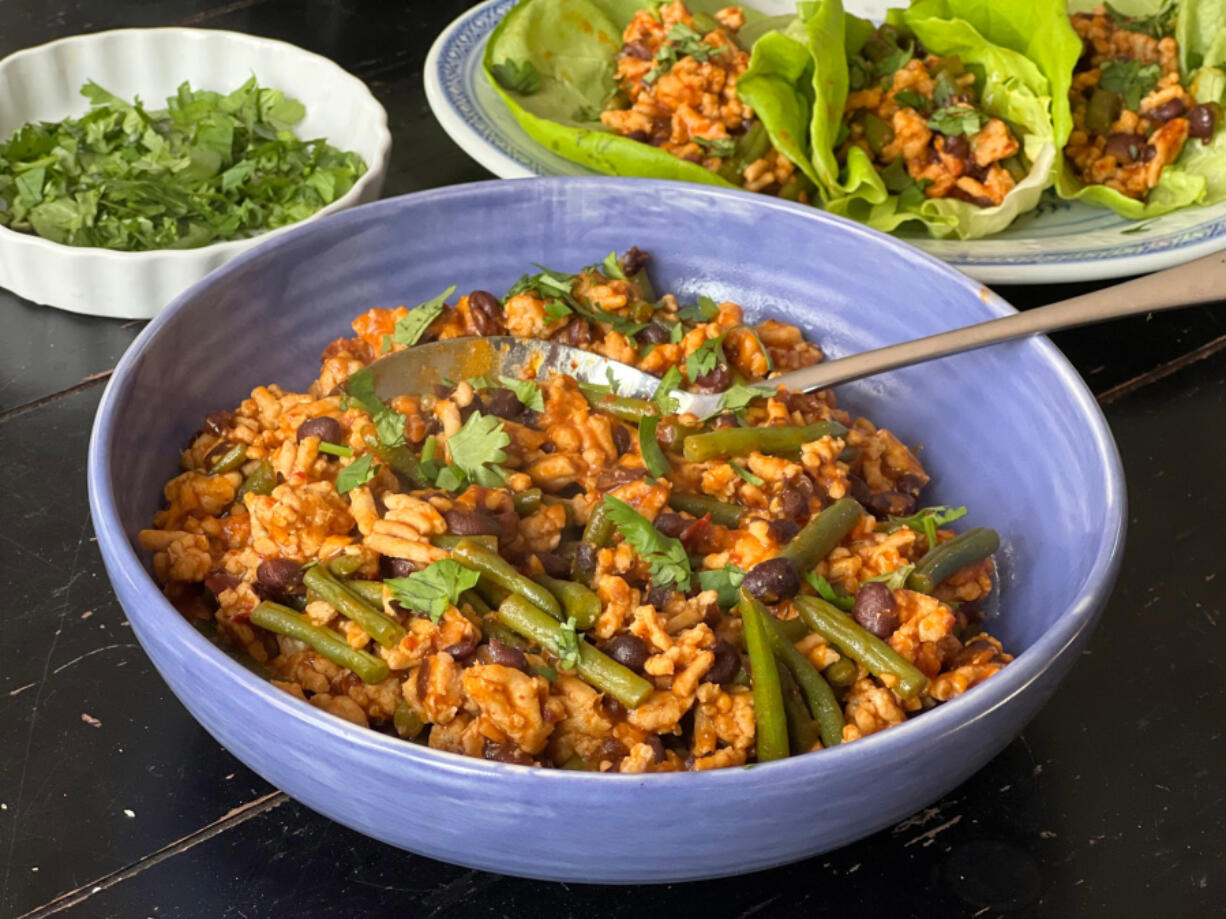 Mark Bittman's take on Ma Po, a Sichuan dish featuring tofu in a spicy sauce, is made with ground chicken, green beans and Sichuan peppercorns for heat.