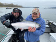 Guide Matt Eleazer with a client and a fine spring Chinook caught during last year?s season. Prospects and projections for spring and summer salmon are up this year, and anglers could be looking at the best season they have seen in a number of years.