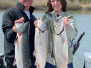 Happy clients with spring Chinook they caught while fishing with guide Matt Eleazer of East Fork Outfitters last year. With the runs improving in almost all waters, local anglers should be in store for much better fishing this spring and summer.