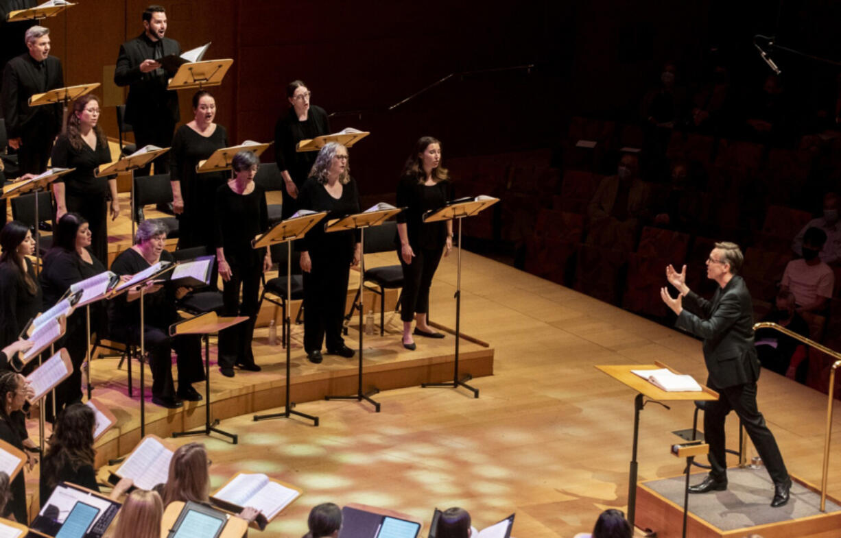 Grant Gershon, right, conducts the Los Angeles Master Chorale at the Walt Disney Concert Hall on Nov. 21 in Los Angeles.