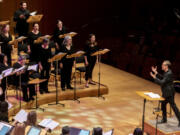 Grant Gershon, right, conducts the Los Angeles Master Chorale at the Walt Disney Concert Hall on Nov. 21 in Los Angeles.