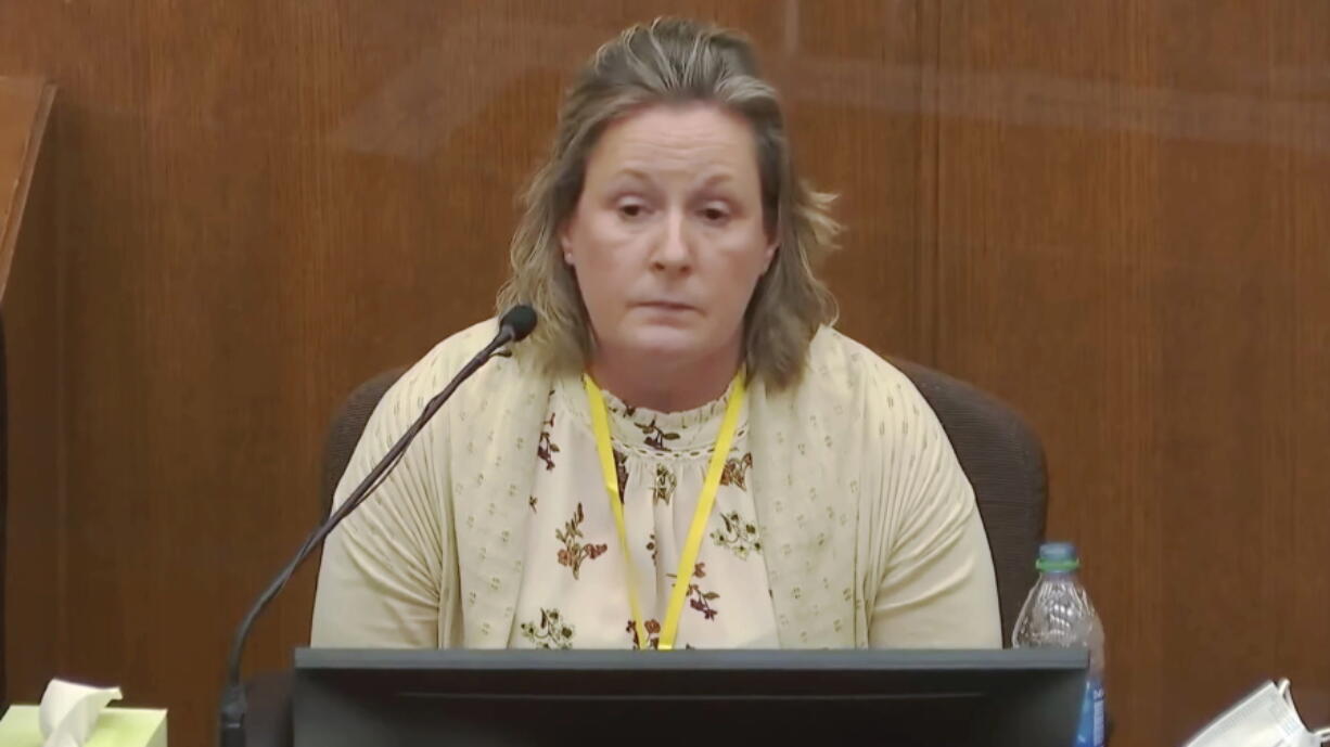 In this screen grab from video, former Brooklyn Center Police Officer Kim Potter takes questions from the prosecution as she testifies in court, Friday, Dec. 17, 2021 at the Hennepin County Courthouse in Minneapolis, Minn.  Potter is charged with first and second-degree manslaughter in the April 11 shooting of Daunte Wright, a 20-year-old Black motorist, following a traffic stop in the Minneapolis suburb of Brooklyn Center.