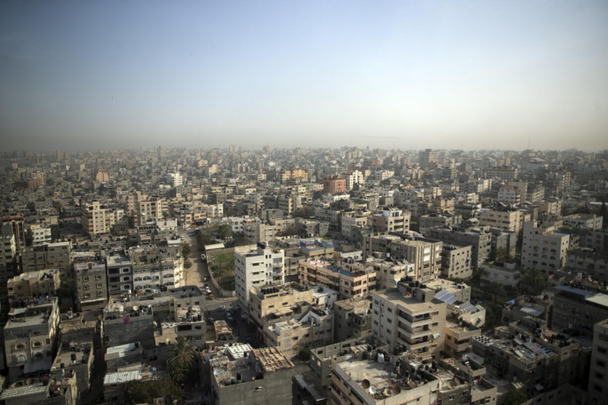 A general vuew of Gaza City is seen Sunday, Dec. 12, 2021. Gaza's Hamas rulers collect millions of dollars a month in taxes and customs at a crossing on the Egyptian border - providing a valuable source of income that helps it sustain a government and powerful armed wing. After surviving four wars and a nearly 15-year blockade, Hamas has become more resilient and Israel has been forced to accept that its sworn enemy is here to stay.