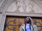 Nathalie Charles, seen outside the Princeton University Chapel in Princeton, N.J., on Wednesday, left her Baptist church at the age of 15 because as a queer woman of Haitian descent, she felt unwelcome in her congregation, with its conservative views on immigration, gender and sexuality.