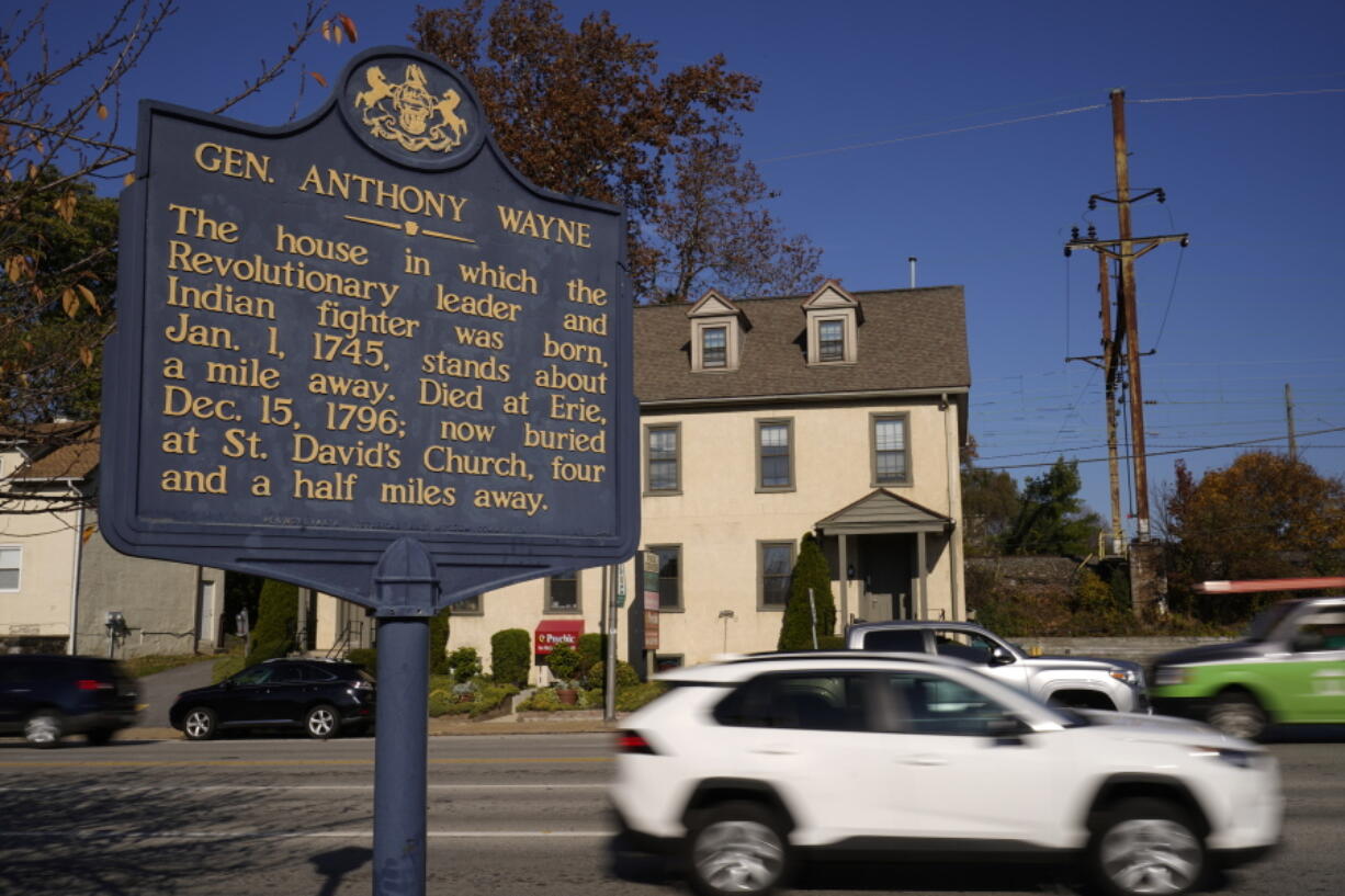 Shown is a Pennsylvania Historical Marker for Revolutionary War Gen. Anthony Wayne in Paoli, Pa., Thursday, Nov. 18, 2021. A recent review of all 2,500 markers the Pennsylvania Historical and Museum Commission had been installing for more than a century, faced a fresh round of questions about just whose stories were being told on the state's roadsides, and the language used to tell them. The increased scrutiny that has focused on factual errors, inadequate historical context and racist or otherwise inappropriate references, prompting the state to remove two markers, revise two and order new text for two others so far. The changes have become grist for the political mill.