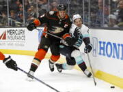 Anaheim Ducks center Ryan Getzlaf, left, collides with Seattle Kraken center Calle Jarnkrok during the first period of an NHL hockey game in Anaheim, Calif., Wednesday, Dec. 15, 2021.