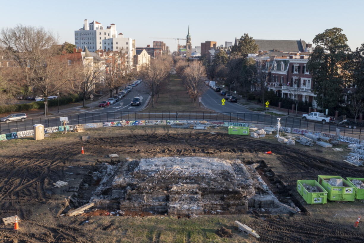 A pile of rubble is all that is left after the removal of the pedestal that once held the statue of Confederate General Robert E. Lee on Monument Ave., Thursday Dec. 23, 2021, in Richmond, Va. Workers will continue their search for a famed 1887 time capsule that was said to be buried under the massive monument. A box found in the pedestal did not contain items described in historic papers.